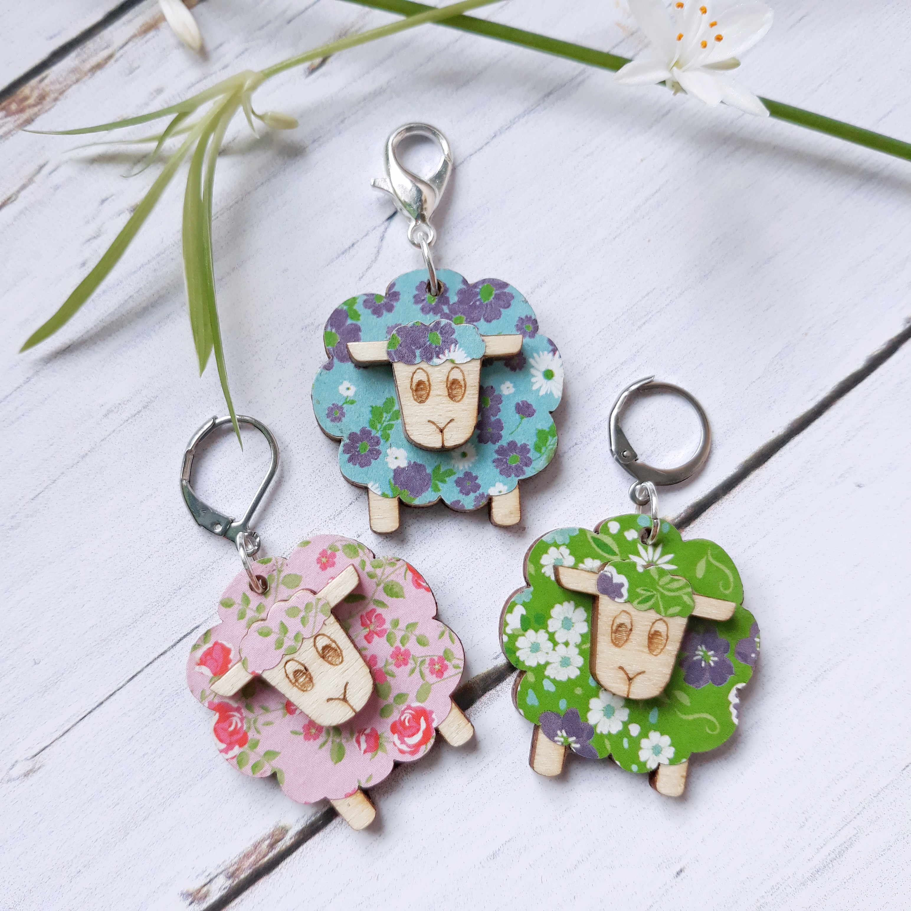 Three wooden stitch markers sheep